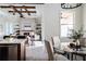 Open kitchen with an island and breakfast nook, overlooking the living room at 1001 Cody Bluffs Rd, Babson Park, FL 33827