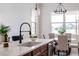 Modern kitchen with a quartz countertop and a farmhouse sink at 1001 Cody Bluffs Rd, Babson Park, FL 33827