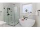 Spa-like bathroom with soaking tub and walk-in shower at 1001 Cody Bluffs Rd, Babson Park, FL 33827
