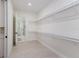 Spacious walk-in closet with ample shelving and hanging space at 1001 Cody Bluffs Rd, Babson Park, FL 33827