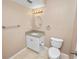 Small bathroom with granite vanity, toilet and shower at 3445 Ewell Rd, Lakeland, FL 33811