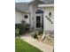 Inviting front entrance with walkway, landscaping, and house number at 5982 Crane Dr, Lakeland, FL 33809