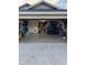 Garage interior with ample storage and a golf cart at 5982 Crane Dr, Lakeland, FL 33809
