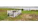 White gazebo with benches overlooking a grassy area at 618 Ridge Ter, Winter Haven, FL 33881