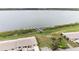 Aerial view showcasing lakefront property with boat slips at 618 Ridge Ter, Winter Haven, FL 33881