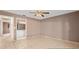 Simple bedroom with tile floors and adjacent bathroom at 618 Ridge Ter, Winter Haven, FL 33881