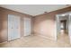 Well-lit bedroom featuring double door closet and tile floors at 618 Ridge Ter, Winter Haven, FL 33881