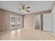 Spacious bedroom with tile floors and access to a patio at 618 Ridge Ter, Winter Haven, FL 33881