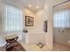 Bathroom with corner soaking tub and separate shower at 6614 Englelake Dr, Lakeland, FL 33813