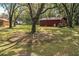 Red barn in a grassy area at 7206 Ranch Rd, Lakeland, FL 33809