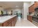 Modern kitchen with stainless steel appliances and large island at 7929 Lake James Blvd, Lakeland, FL 33810
