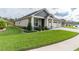 Landscaped front yard with lush green grass at 7929 Lake James Blvd, Lakeland, FL 33810