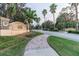Lake James community entrance with landscaped walkway at 7929 Lake James Blvd, Lakeland, FL 33810