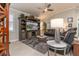 Comfortable living room with a large TV and seating area at 7929 Lake James Blvd, Lakeland, FL 33810