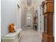 Bright and airy entryway with bench seating and decorative accents at 7929 Lake James Blvd, Lakeland, FL 33810