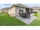 Outdoor patio with seating area and paver stones at 7929 Lake James Blvd, Lakeland, FL 33810