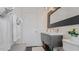 Modern bathroom with single vanity and a shower at 1 Loma Linda, Lakeland, FL 33813
