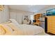 Comfortable bedroom with a queen-size bed and built-in shelving at 1 Loma Linda, Lakeland, FL 33813