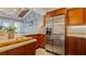Spacious kitchen with granite countertop and stainless steel appliances at 1 Loma Linda, Lakeland, FL 33813