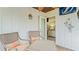 Relaxing patio with seating area, offering a view of the bedroom at 1 Loma Linda, Lakeland, FL 33813