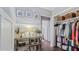 Well-organized hall closet with shelving and hanging rod at 1 Loma Linda, Lakeland, FL 33813