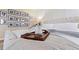 Close-up of bedroom with a wooden tray and flowers on bed at 1 Loma Linda, Lakeland, FL 33813