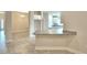 Kitchen with granite countertops and breakfast bar at 1213 Tagliamento Ln, Haines City, FL 33844