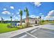 Community pool with lounge chairs and a covered patio at 1213 Tagliamento Ln, Haines City, FL 33844