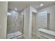 Bathroom with walk-in shower and tile flooring at 1213 Tagliamento Ln, Haines City, FL 33844