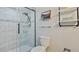 Modern bathroom with a walk-in shower and stylish tile work at 1215 Cypress E Pt, Winter Haven, FL 33884