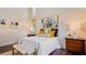 Bright bedroom with high ceilings, wood floors, and large windows at 1215 Cypress E Pt, Winter Haven, FL 33884