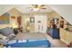 Bright bedroom with a ceiling fan, dresser, and a comfortable bed at 1935 Austin Ter, Winter Haven, FL 33884