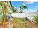 Side yard with bamboo plants and AC unit at 1935 Austin Ter, Winter Haven, FL 33884