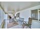 Sunroom with windows, ceiling fan, and workout bench at 384 Winter Ridge Blvd, Winter Haven, FL 33881