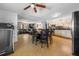 View of kitchen, dining area, and living room with open floor plan at 855 Candyce Ave, Lakeland, FL 33815
