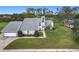 Two-story house with attached garage and expansive yard at 92 Wood Hall Dr, Mulberry, FL 33860