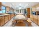 Large kitchen with a center island and breakfast nook at 92 Wood Hall Dr, Mulberry, FL 33860