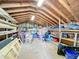 Large attic with shelving for storage and ample space at 92 Wood Hall Dr, Mulberry, FL 33860