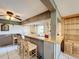 Wet bar with seating and glass storage at 92 Wood Hall Dr, Mulberry, FL 33860