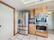 Updated kitchen with stainless steel appliances and ample counter space at 92 Wood Hall Dr, Mulberry, FL 33860