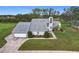 Two-story house with attached garage and landscaping at 92 Wood Hall Dr, Mulberry, FL 33860