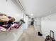 Large walk-in closet with ample shelving and hanging space at 92 Wood Hall Dr, Mulberry, FL 33860