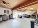 Two-car garage with extra storage space and workshop area at 92 Wood Hall Dr, Mulberry, FL 33860