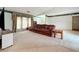 Relaxing living room with plush sofa and neutral decor at 92 Wood Hall Dr, Mulberry, FL 33860