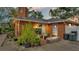 Brick patio with potted plants and outdoor storage at 4264 Stafford Dr, Winter Haven, FL 33880