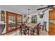Casual dining area with a table and chairs near kitchen and backyard access at 4264 Stafford Dr, Winter Haven, FL 33880