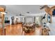 Spacious living room with hardwood floors, featuring a dining area and comfortable seating at 4264 Stafford Dr, Winter Haven, FL 33880