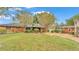 Spacious backyard with shed and large grassy area at 4264 Stafford Dr, Winter Haven, FL 33880