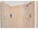 Clean shower with beige tile and modern fixtures at 4264 Stafford Dr, Winter Haven, FL 33880