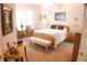 Bright bedroom with a king-size bed and plenty of natural light at 108 Lake Region N Blvd, Winter Haven, FL 33881